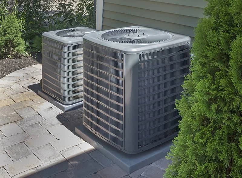 Pair of residential AC condensers installed by Air Factory